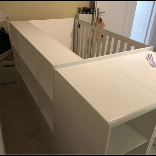 Cot that converts to bed with nightstand and desk used, with Greco strom mattress