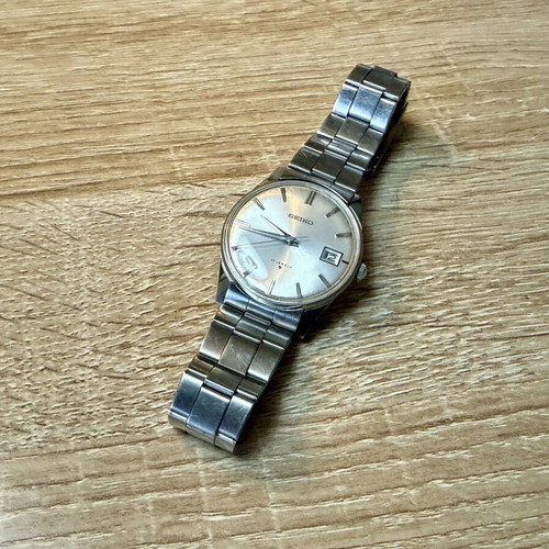 Seiko Vintage wristwatch used with original bracelet, white dial