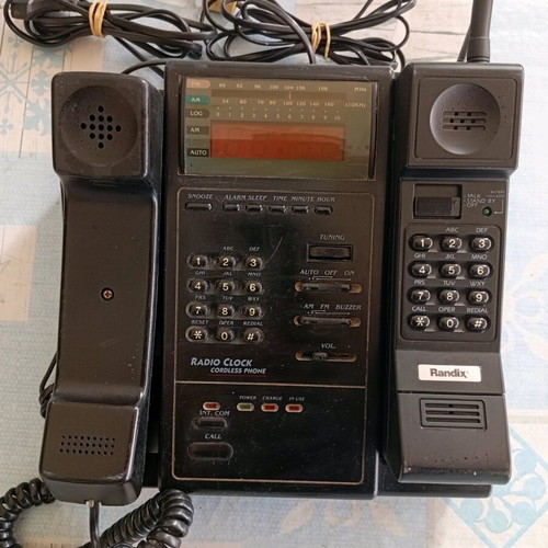 Cordless and landline phone used with radio and clock