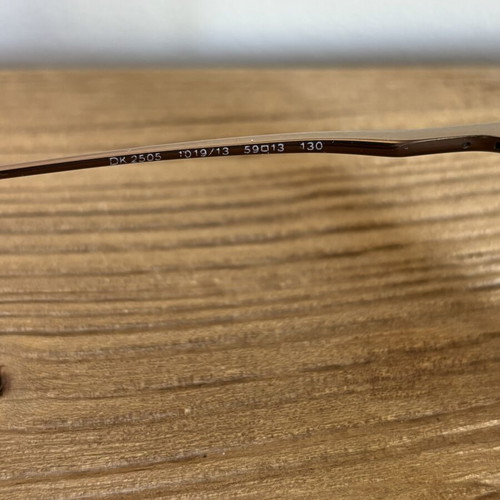 Donna Karan Bronze Pilot Sunglasses used
