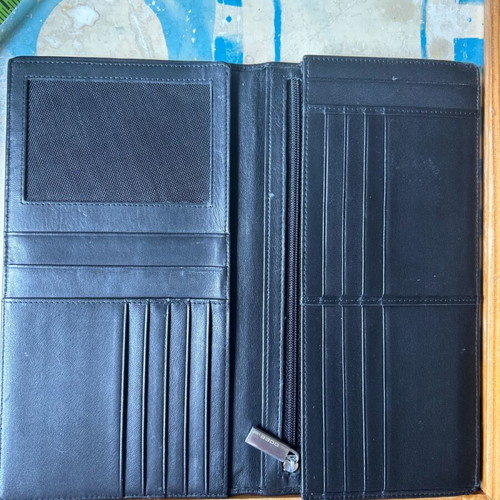 Large leather wallet used with multiple compartments, black