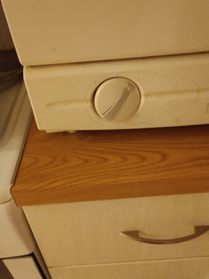 Carad countertop dishwasher used, functional with loose button