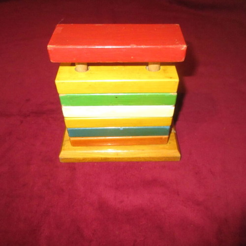 Wooden toy clock coil used 70s