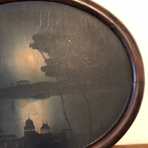 Artwork used, old seascape night painting in oval wooden frame