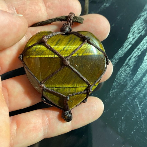 Tigers eye heart pendant made of semi-precious stone like new