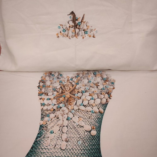 Snurk 2-in-1 duvet cover and blanket with mermaid design, organic cotton
