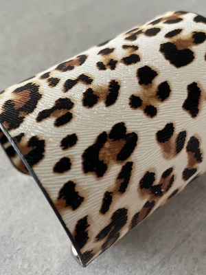 Women's metal bracelet with animal print pattern like new