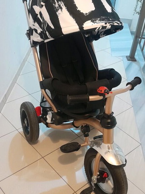 Bolide children's tricycle with storage and sunshade like new