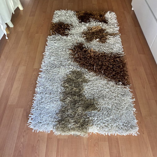 Handmade Shaggy Rug in Ecru and Earth Tones like new