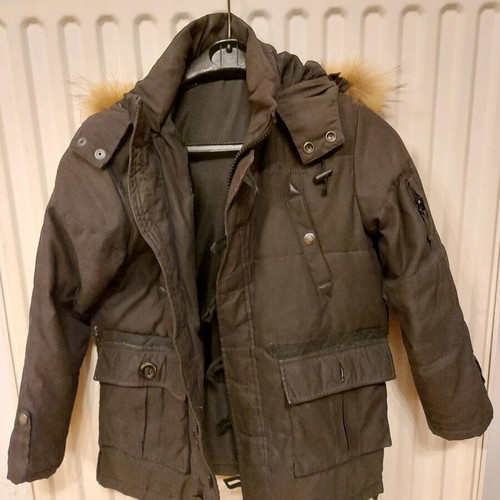 Children's warm jacket black like new, 9 years old