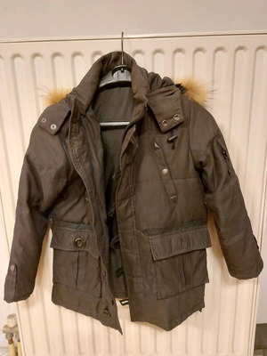 Children's warm jacket black like new, 9 years old