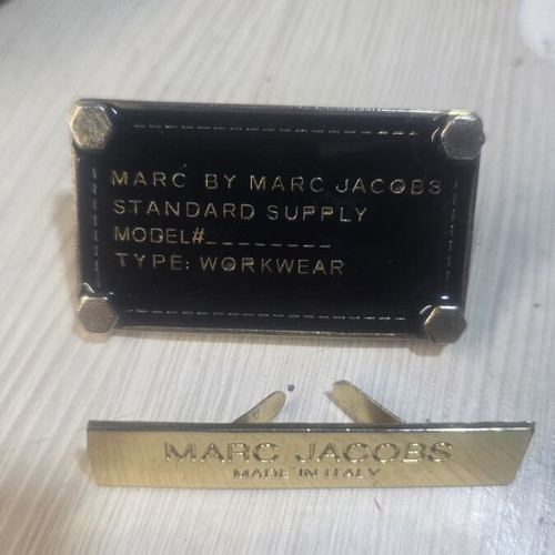 Marc Jacobs metal logos like new