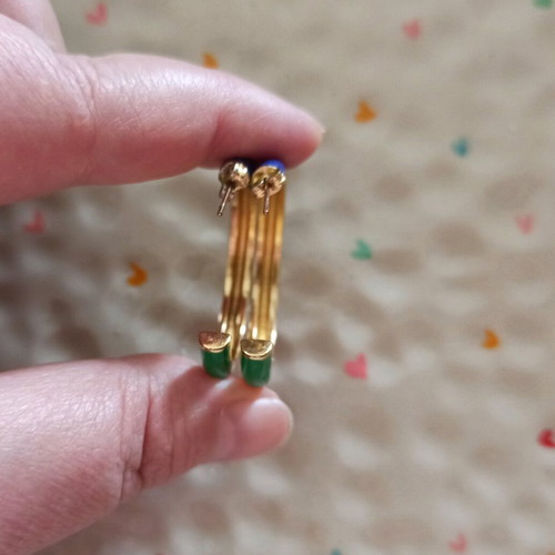 Striped multicolor hoop earrings made of steel like new