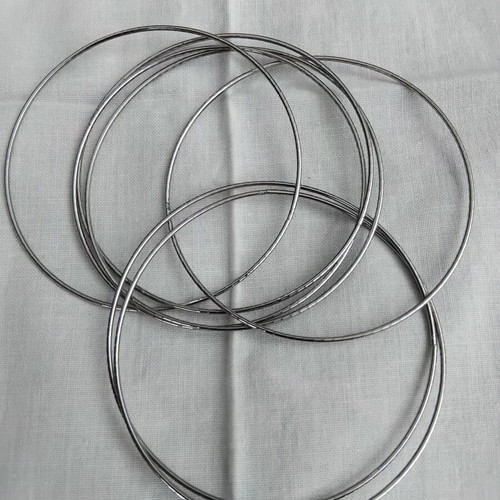 Bracelet of 7 Days with 7 braided rings silver color like new