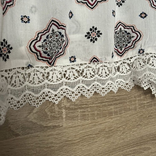 Top with lace and cords Only size 36 like new, white