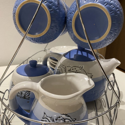 Ceramic tea set used with carved designs, 6 cups