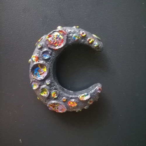 Handmade magnet from white cement with acrylics and varnish