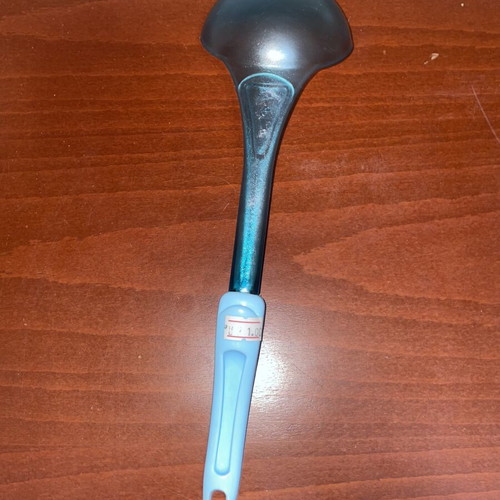Blue serving ladle with ergonomic handle