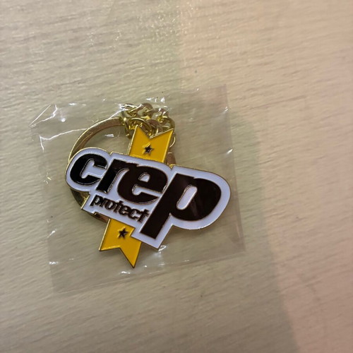 Crep Protect keychain accessory new, gold