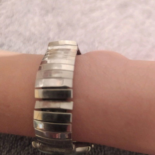 Women's watch used with elastic grey silver bracelet