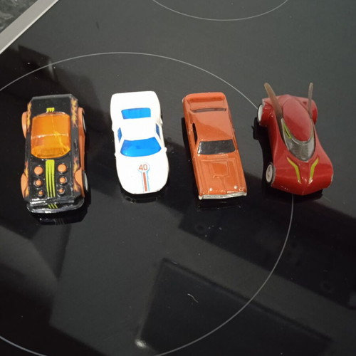 Toy cars used, set of 4 assorted