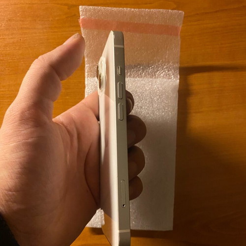 iPhone 13 like new, white, with 81% battery
