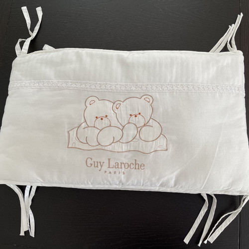 Guy Laroche crib bedding set used with blanket and mosquito net
