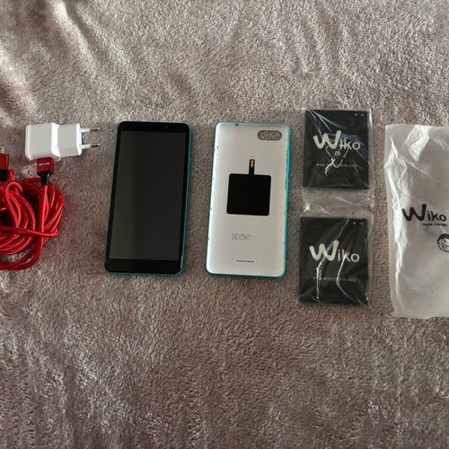 Wiko mobile phone new with 2 extra batteries and 1 extra case