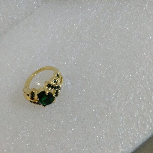 Ring with Oval Green Stone in Gold Color like new