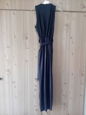 Black jumpsuit like new with deep neckline, one size, Greek brand
