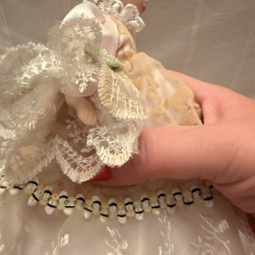 Porcelain doll vintage used, girl on stand