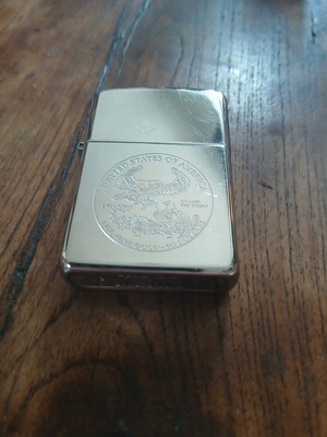 Zippo lighter used with embossed eagle emblem