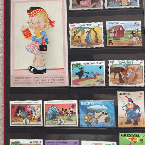 Disney collectible album with 220 stamps and 16 cards