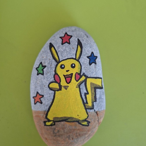 Handmade Pikachu decorative item with acrylic paint