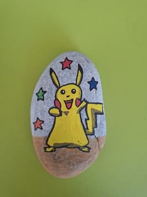 Handmade Pikachu decorative item with acrylic paint
