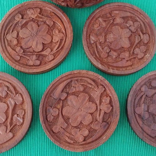 Handmade wooden coasters like new, set of six with carved floral designs