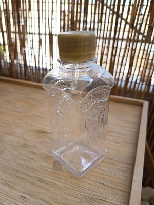 Holy water bottle like new with Christ and Virgin Mary figures