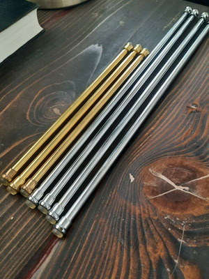 Metal Adjustable Curtain Rods like new, gold and silver