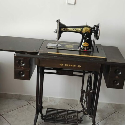 Hermes De Luxe Vintage Sewing Machine used with Wooden Table