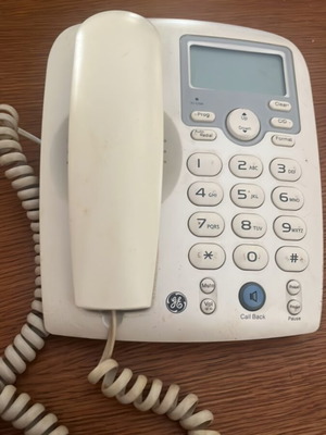 Landline phone used, white, wired, functional