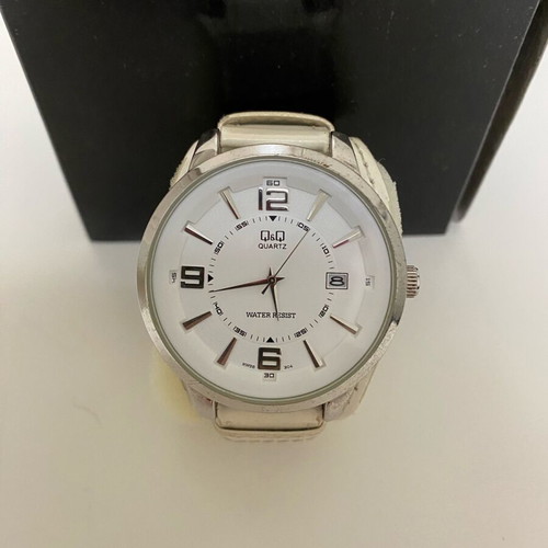 Quartz watch used, beige, needs strap replacement