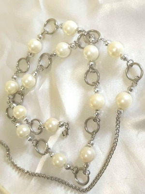 Unique expandable belt with pearls and metal elements like new
