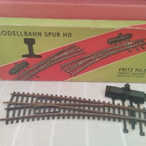 HO scale railway switch parts with bridge pieces and direction change base