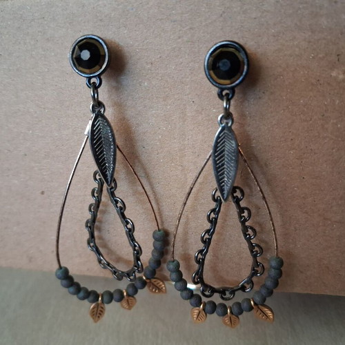 Earrings used black with gold accents