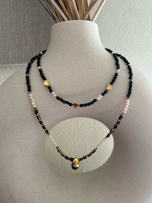 Layering necklace with steel pendant and gold details, new
