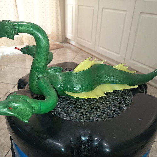 Playmobil car and dragon used with many damages