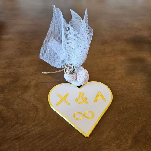 Heart-shaped bomboniera-soupla custom made with gold trim