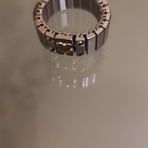 Silver ring with gold heart stainless steel new, size 8