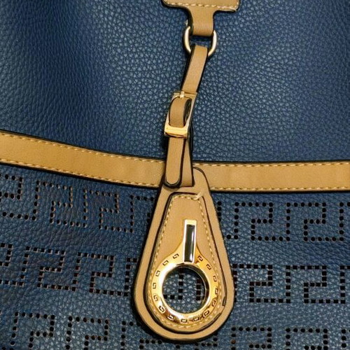 Large women's hobo bag, dark blue with brown details, perforated Greek meander