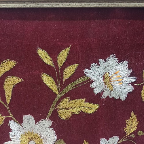 Embroidered textile painting used with gold thread on velvet